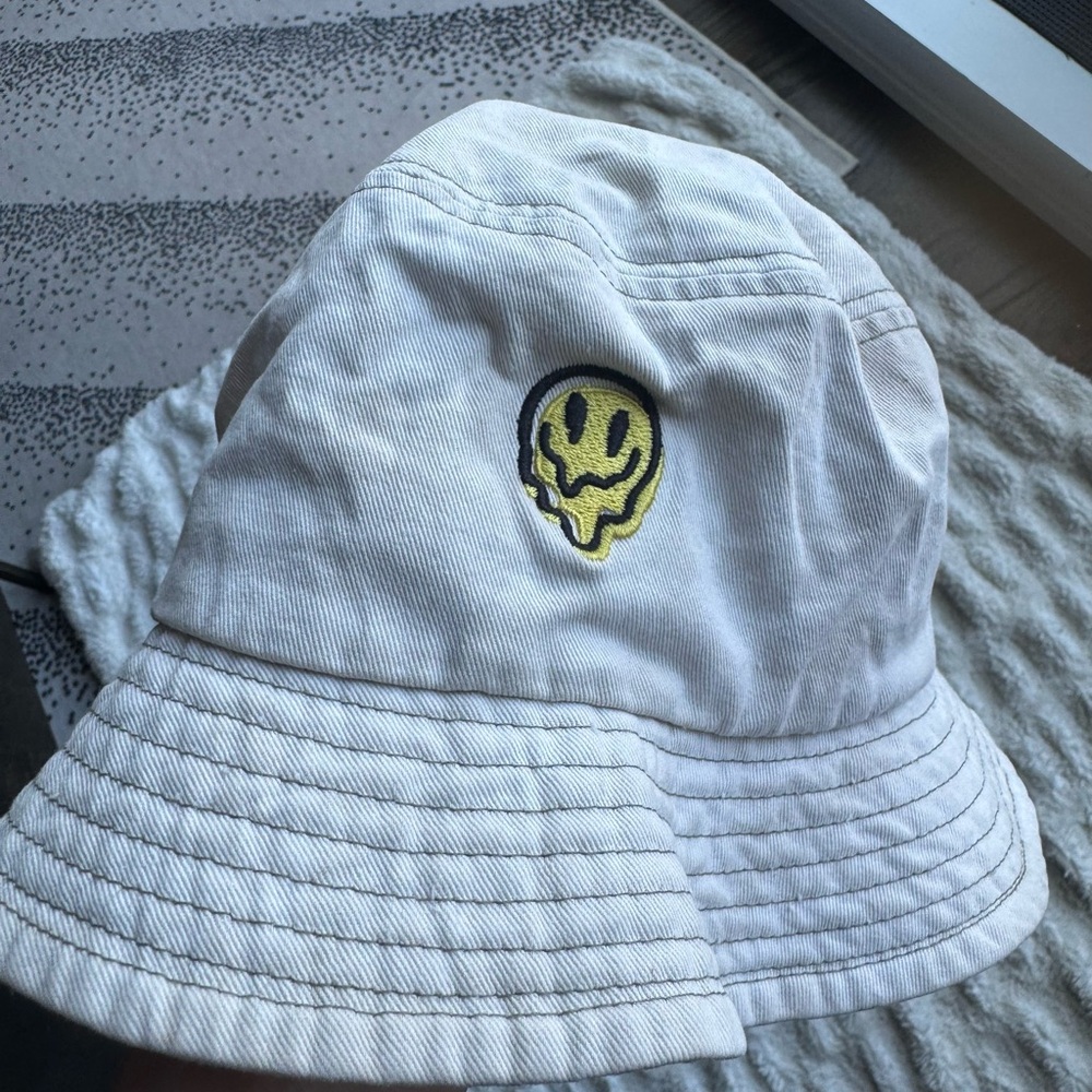 Brixton Cream Bucket Hat with Yellow Drip Smiley Patch